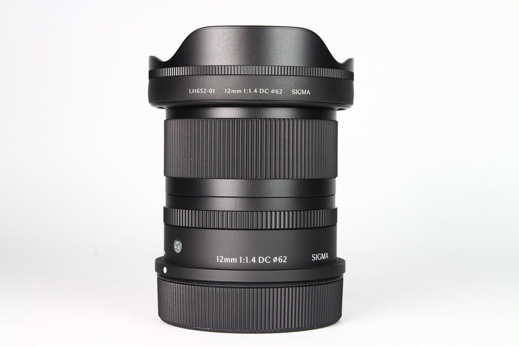 Lente Sigma 12mm Contemporary DC F:1.4 Para Canon RF-S. Usado