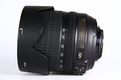 Lente NIKON DX 18-105mm F3.5-5.6 VR. Semi Nuevo
